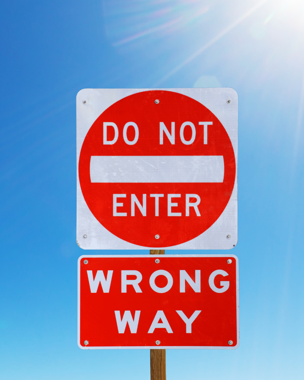 wrong-way sign on road