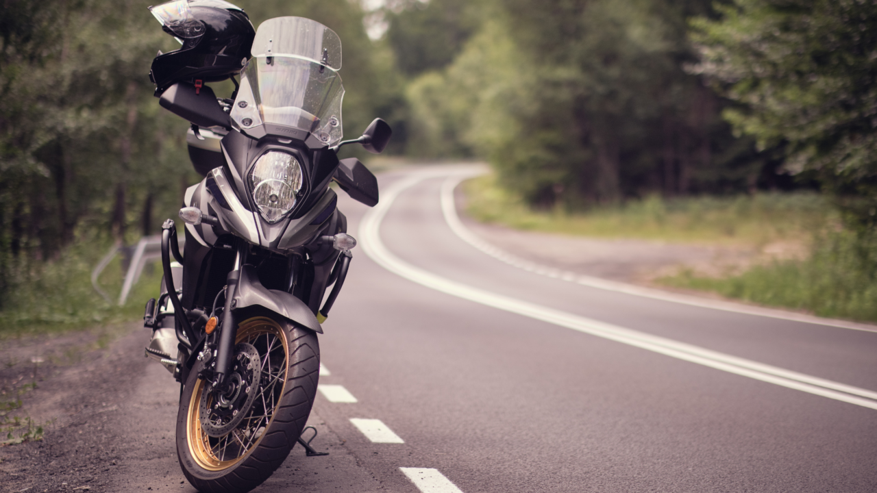 Motorcycle parked on the side of the road.