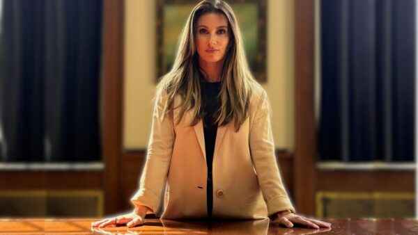 Personal Injury Attorney Gina Montgomery poses in Rutter Mills conference room